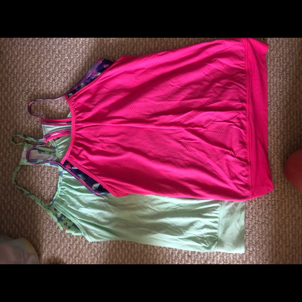 Two ivivva tank tops.